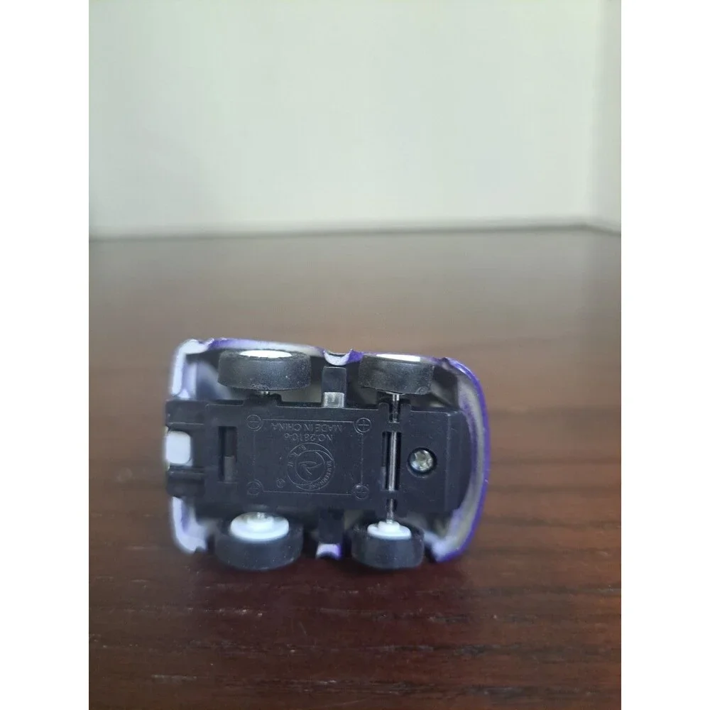 Vintage San Ren Hang Purple Fire Truck Pull Back Racer